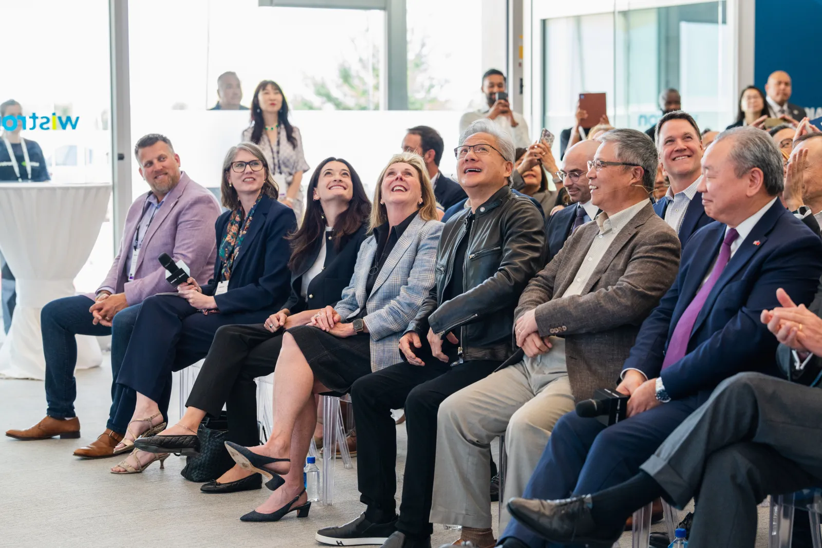 NVIDIA CEO Jensen Huang and guests seated at the Wistron D1 Grand Opening event